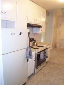 255 South Rengstorff Avenue, Unit 94 Mountain View, CA 94040 - Photo 6 of 12 a kitchen with stainless steel appliances a refrigerator and a stove