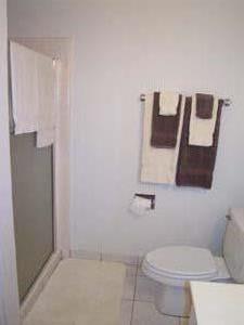 255 South Rengstorff Avenue, Unit 94 Mountain View, CA 94040 - Photo 10 of 12 a white toilet sitting next to a bathroom sink