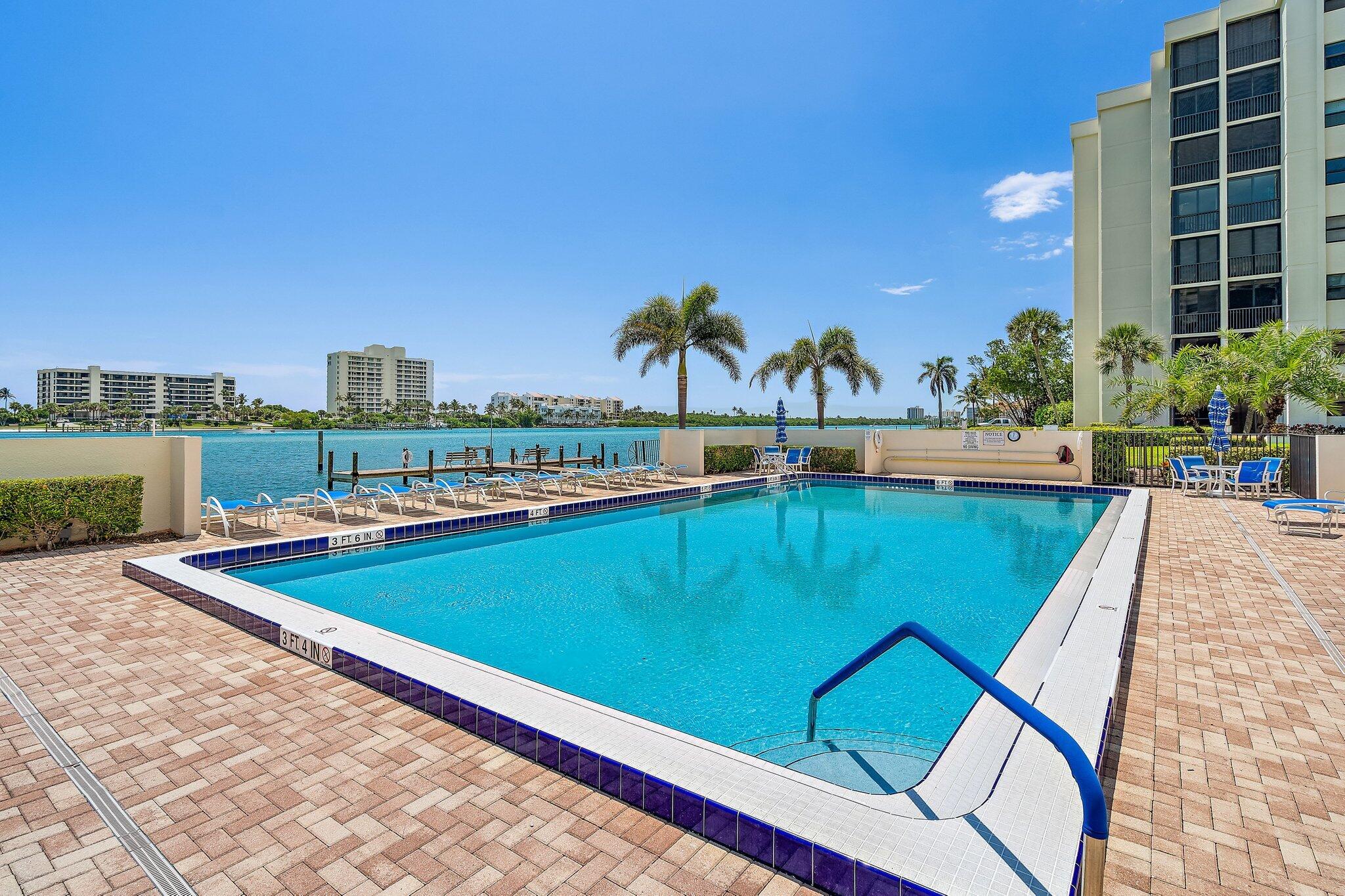 19800 Sandpointe Bay Drive, Unit 210 Jupiter, FL 33469 - Photo 21 of 59 a view of a swimming pool with outdoor space