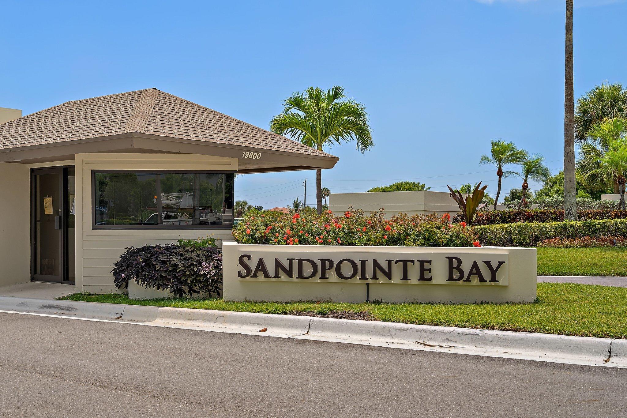 19800 Sandpointe Bay Drive, Unit 210 Jupiter, FL 33469 - Photo 37 of 59 a view of a street sign