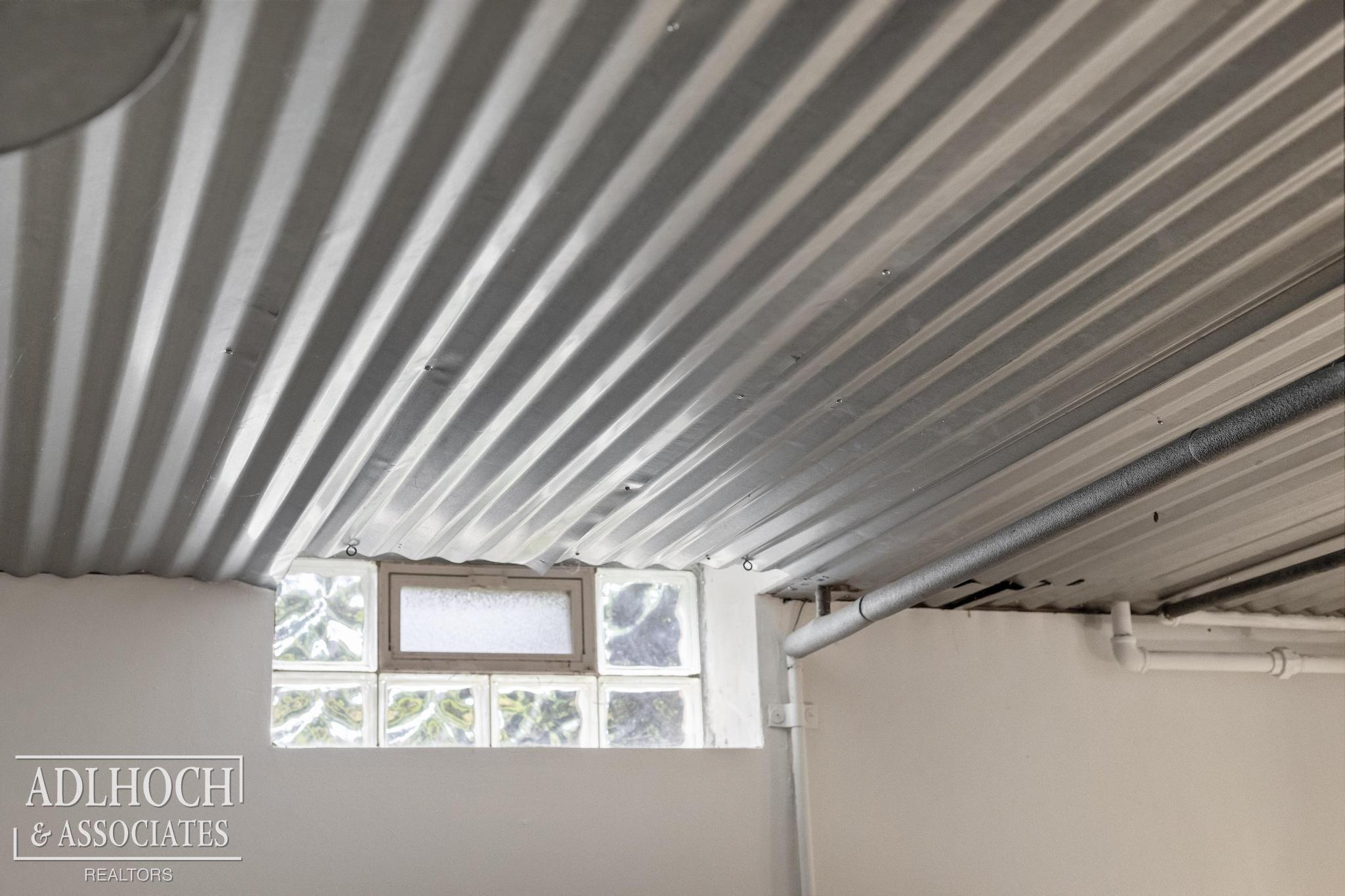 770 Lincoln Road Grosse Pointe, MI 48230 - Photo 31 of 56 Corrugated metal ceilings