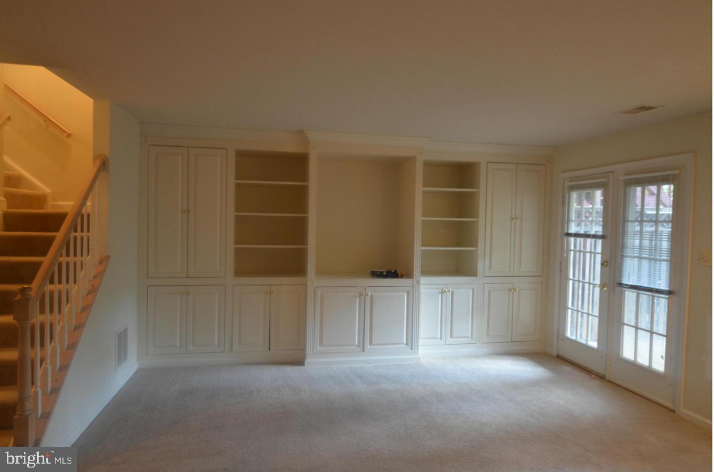 8173 Boss Street Vienna, VA 22182 - Photo 48 of 59 Built-in shelves in Basement Rec room