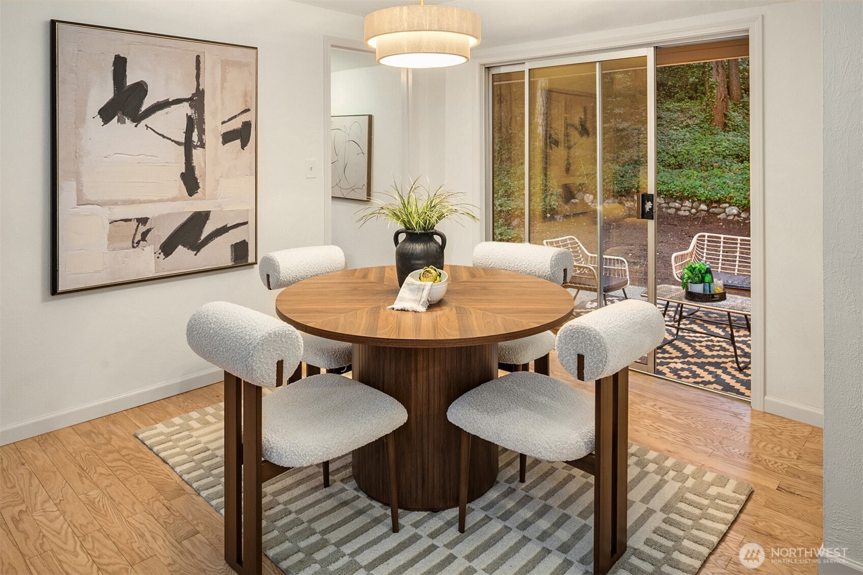 24315 104th Place West Edmonds, WA 98020 - Photo 13 of 29 a view of a dining room with furniture window and wooden floor