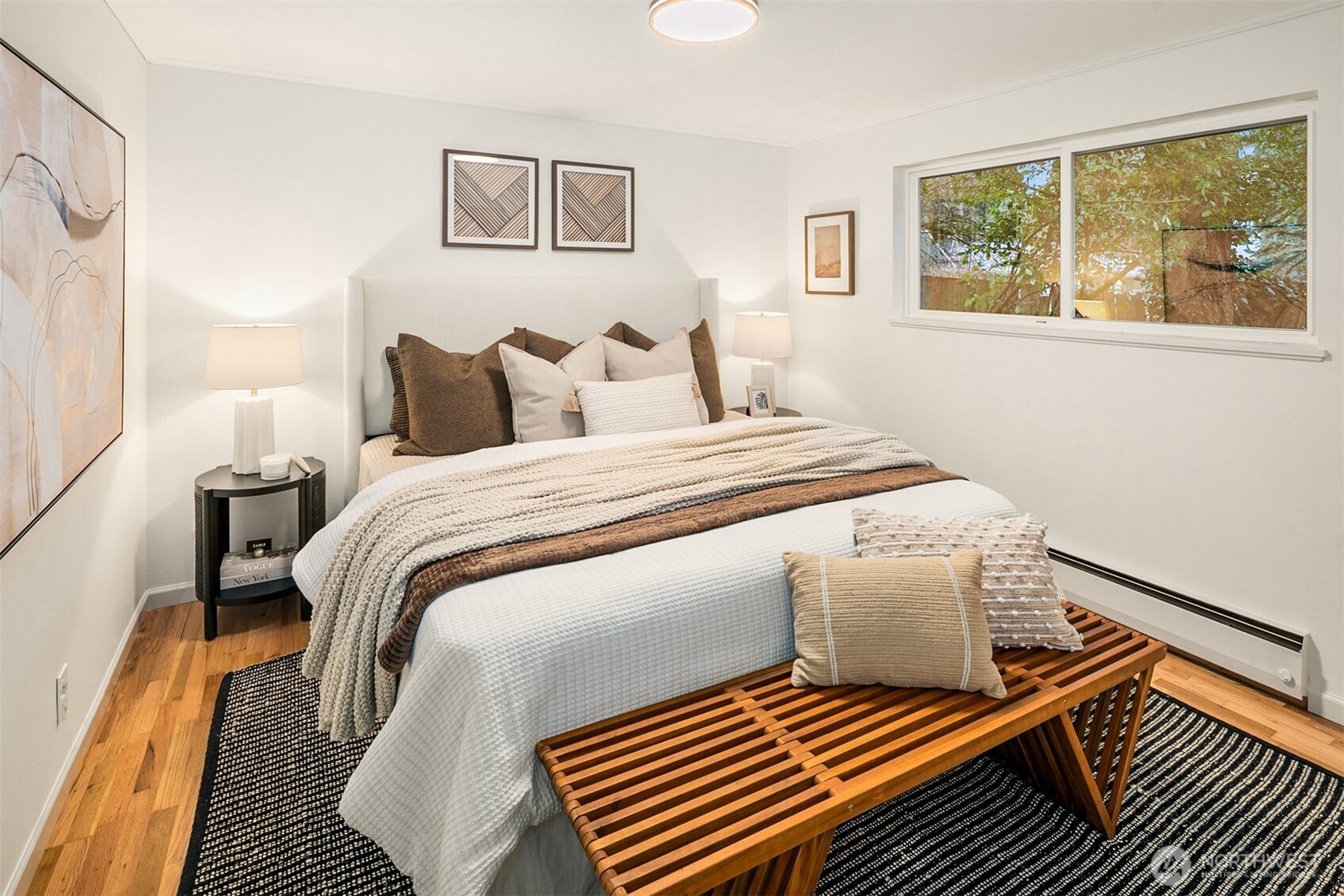 24315 104th Place West Edmonds, WA 98020 - Photo 20 of 29 a bedroom with a bed and wooden floor