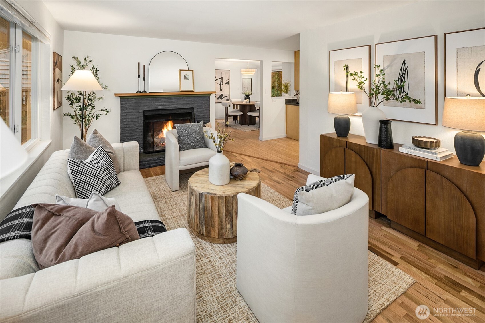 24315 104th Place West Edmonds, WA 98020 - Photo 3 of 29 a living room with furniture a fireplace and a mirror