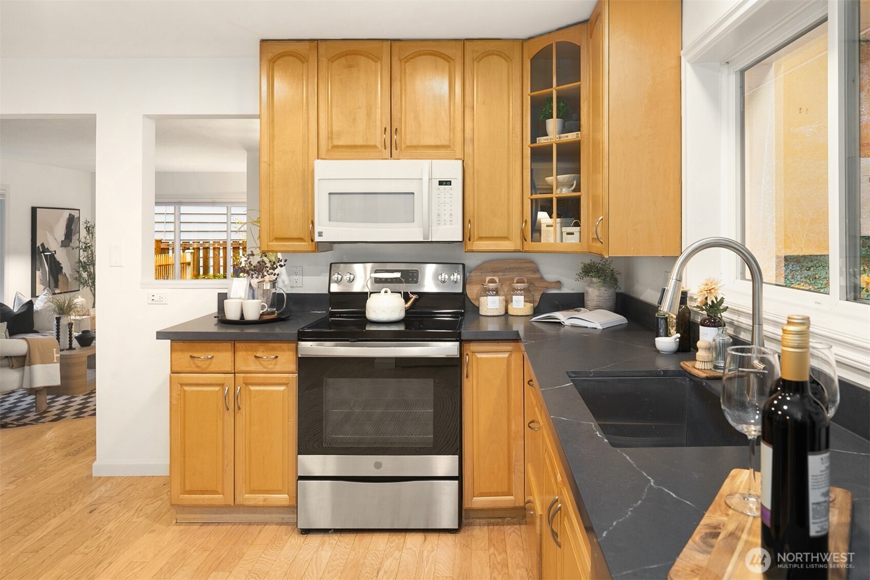 24315 104th Place West Edmonds, WA 98020 - Photo 8 of 29 a kitchen with stainless steel appliances granite countertop a sink stove and cabinets