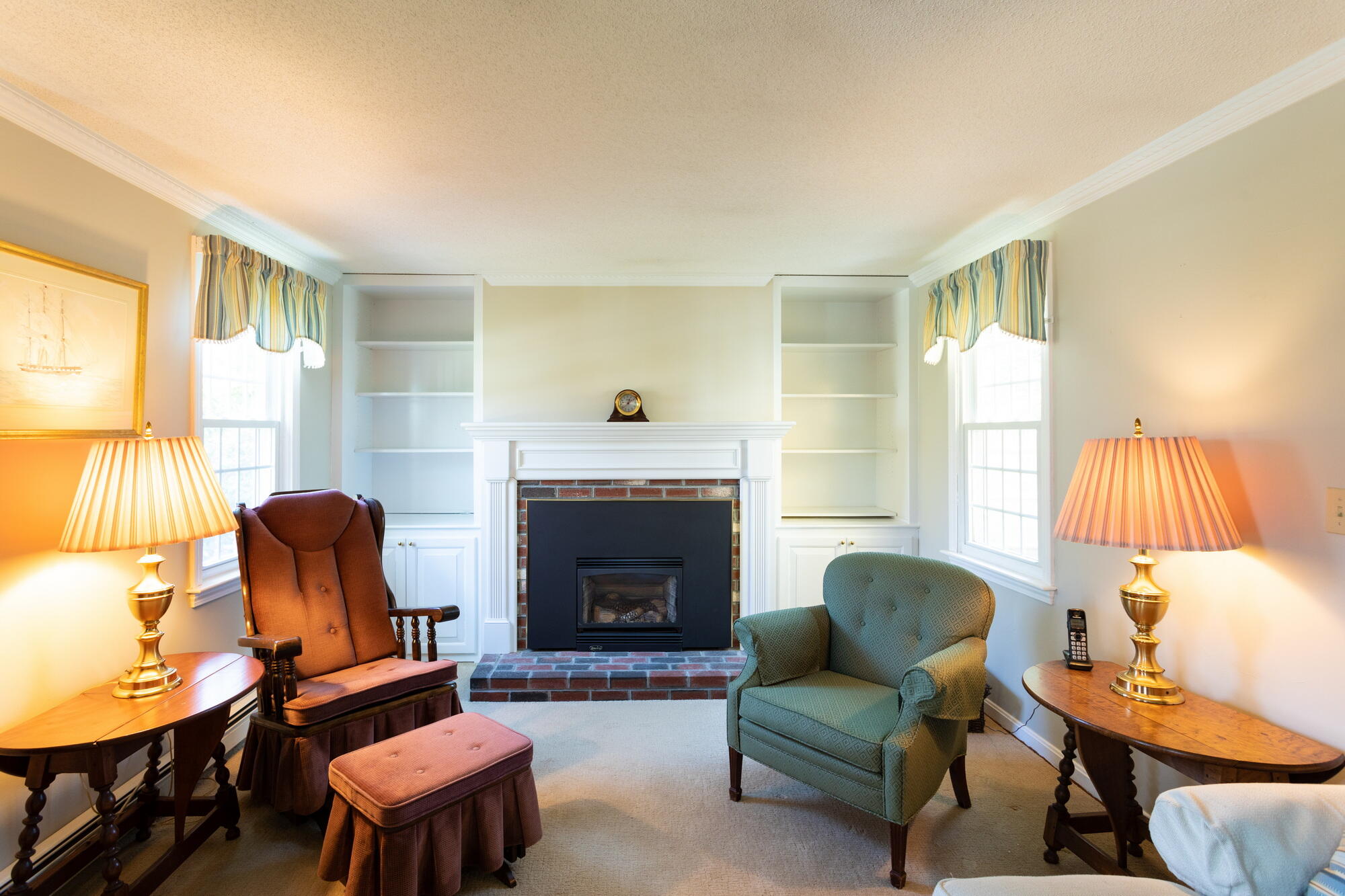 91 Hawser Bend Centerville, MA 02632 - Photo 12 of 42 a living room with furniture and a fireplace