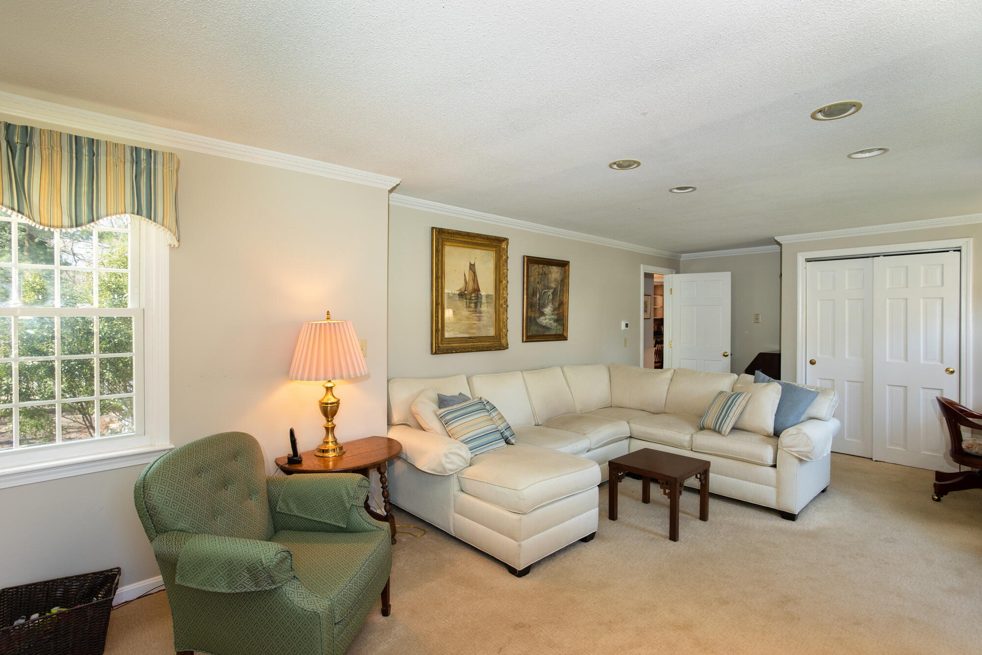 91 Hawser Bend Centerville, MA 02632 - Photo 13 of 42 a living room with furniture and a window