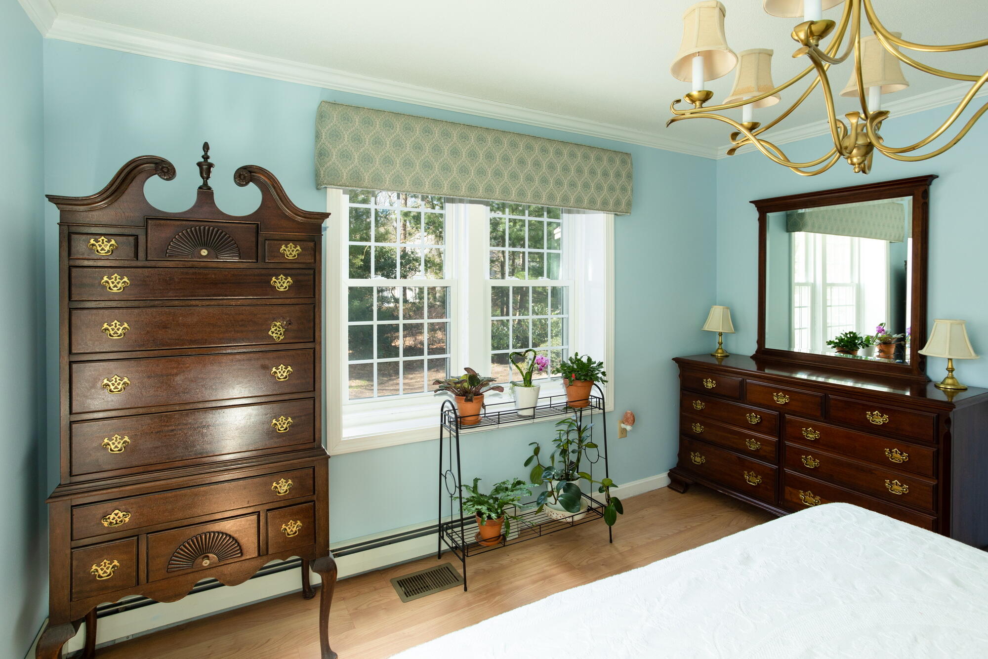 91 Hawser Bend Centerville, MA 02632 - Photo 15 of 42 a room with a chair and a chandelier