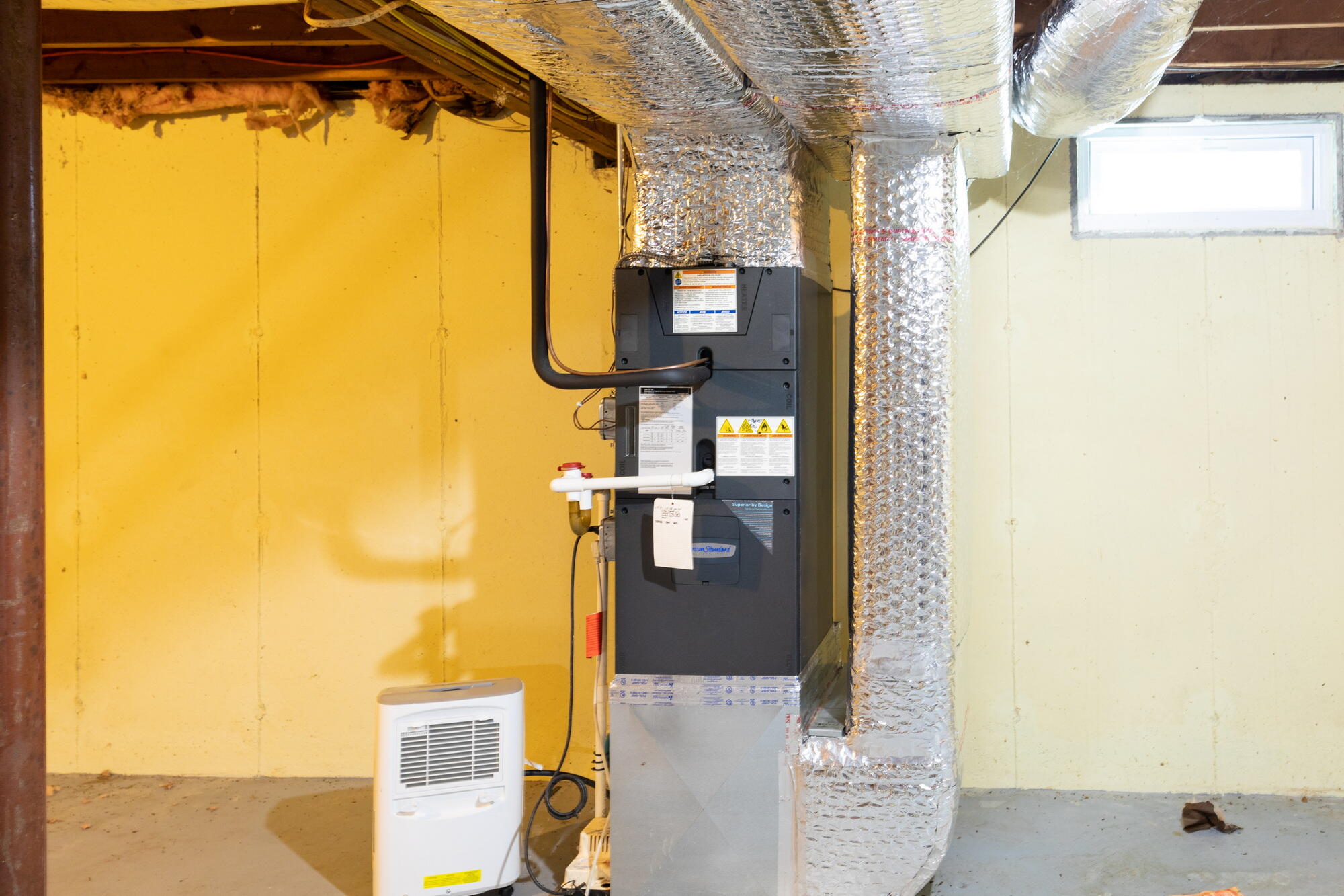 91 Hawser Bend Centerville, MA 02632 - Photo 23 of 42 a front view of a house with a glass door