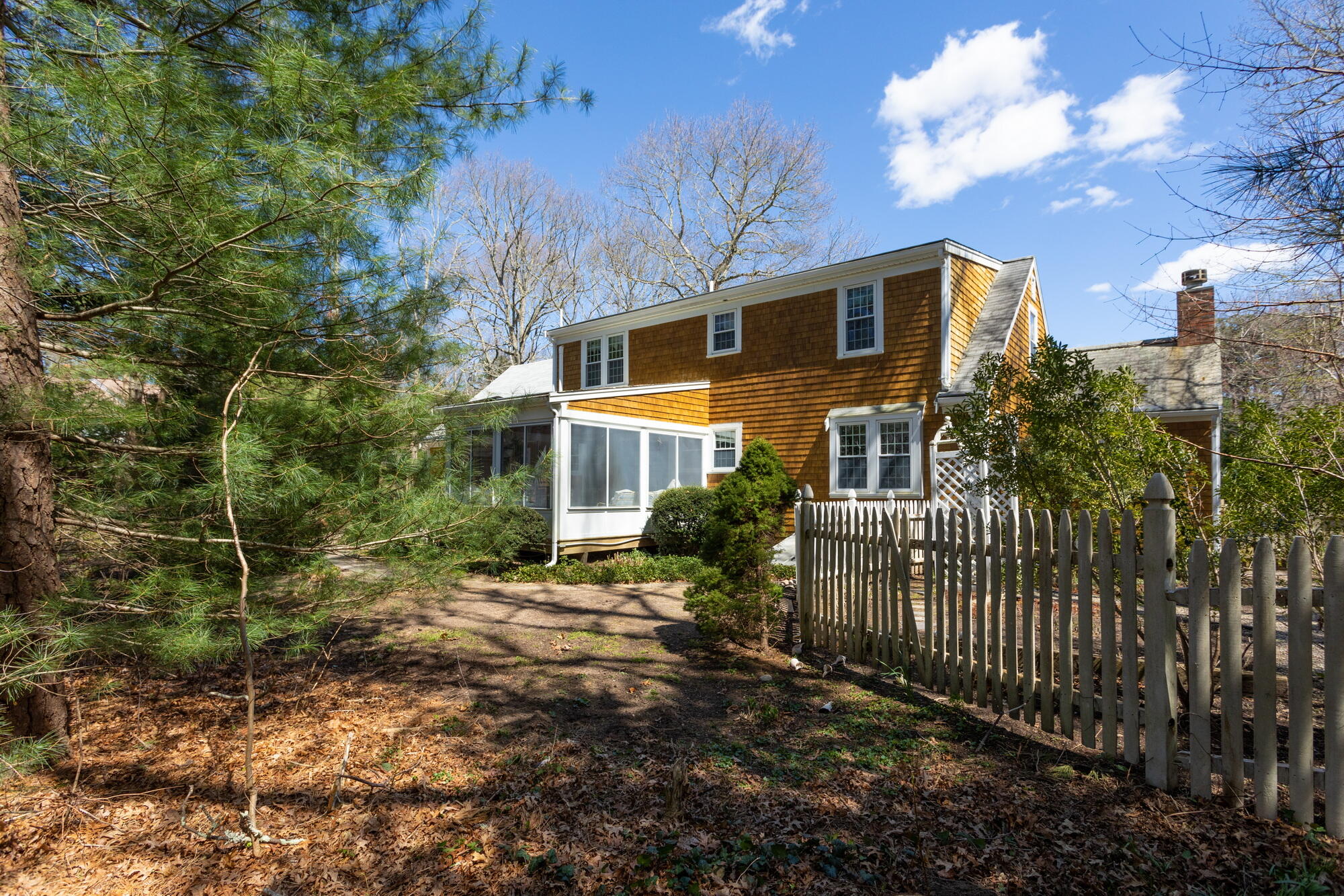 91 Hawser Bend Centerville, MA 02632 - Photo 28 of 42 a view of a house with a yard