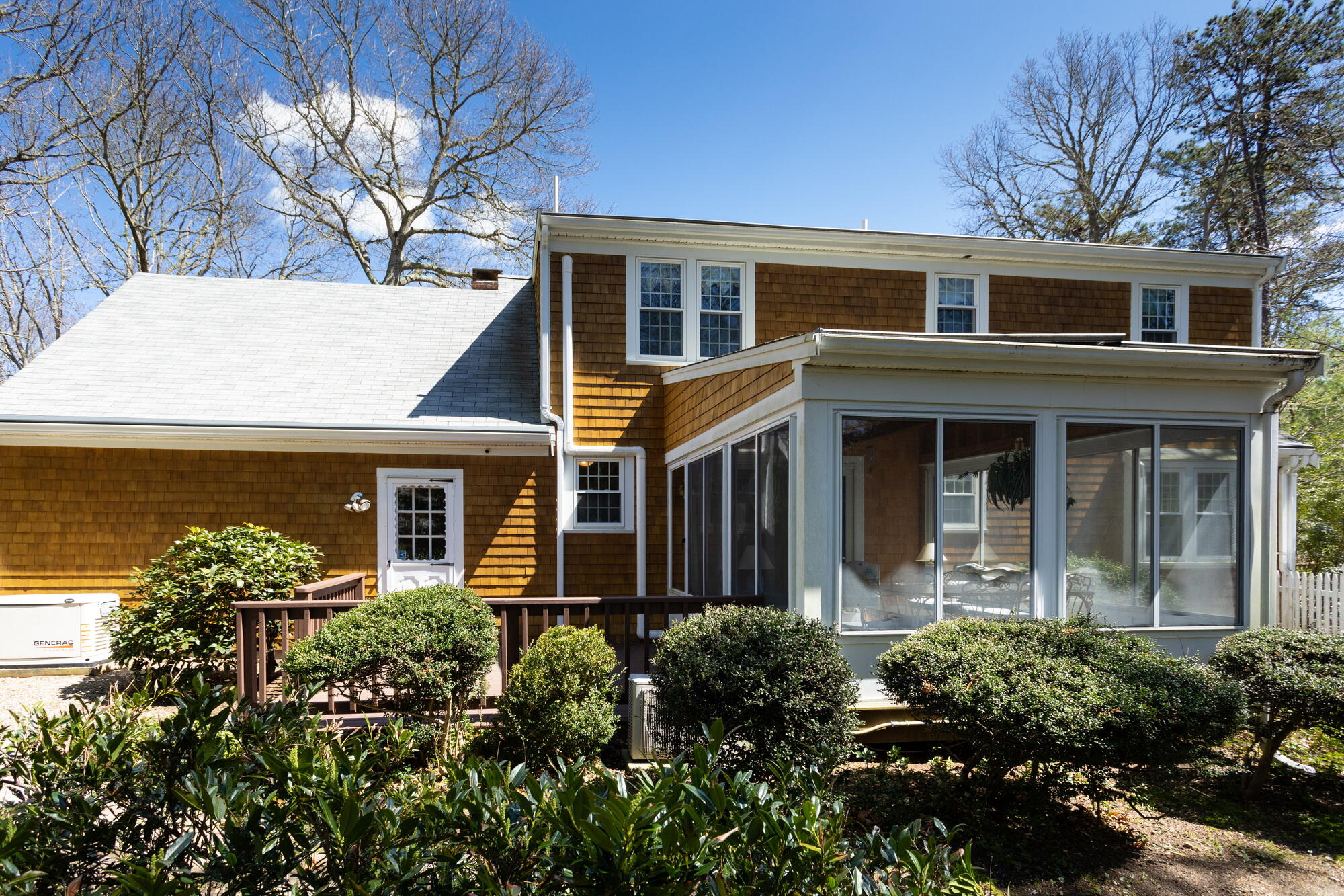 91 Hawser Bend Centerville, MA 02632 - Photo 29 of 42 front view of a house with a yard