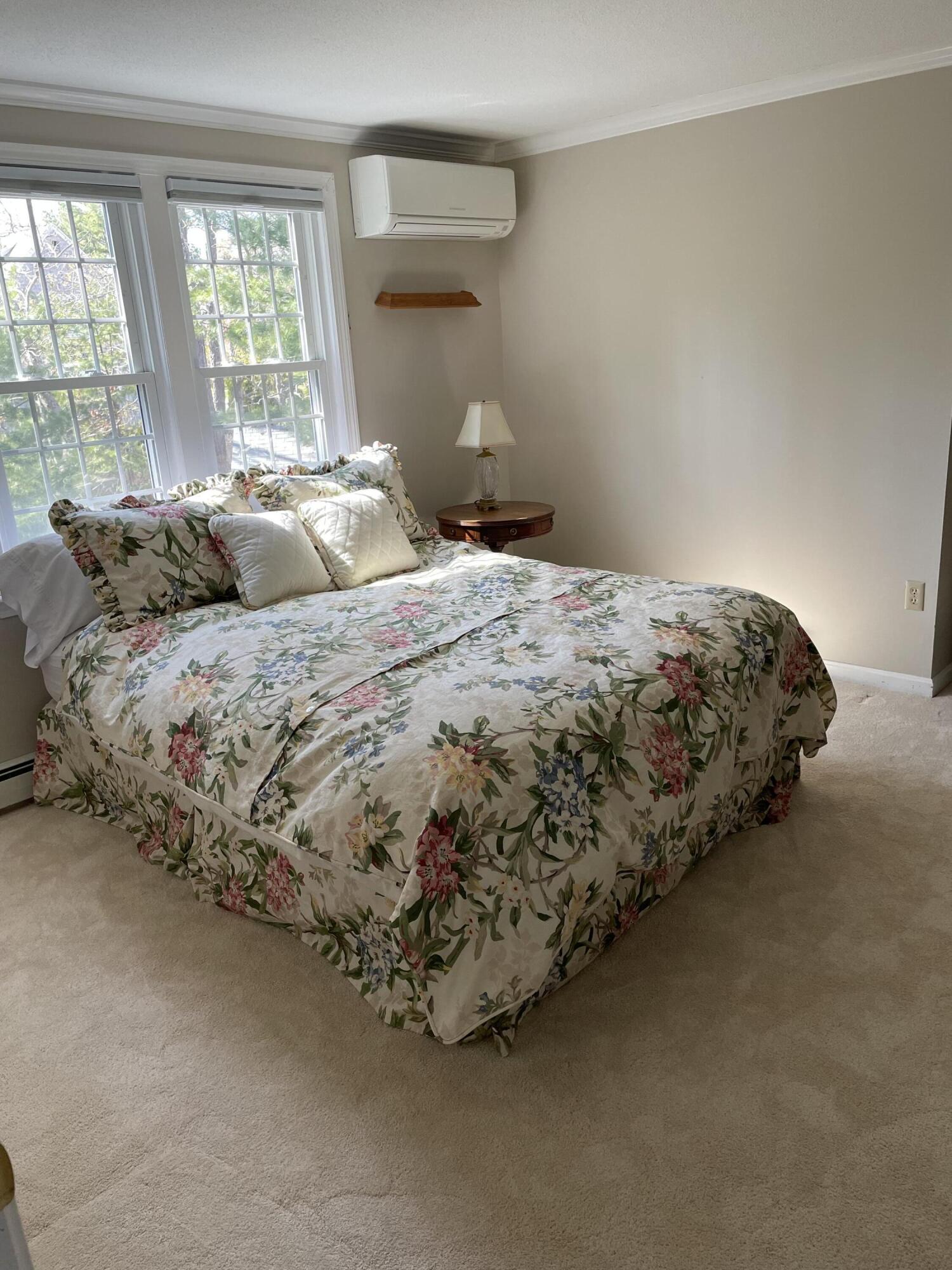 91 Hawser Bend Centerville, MA 02632 - Photo 39 of 42 a bedroom with a bed and window