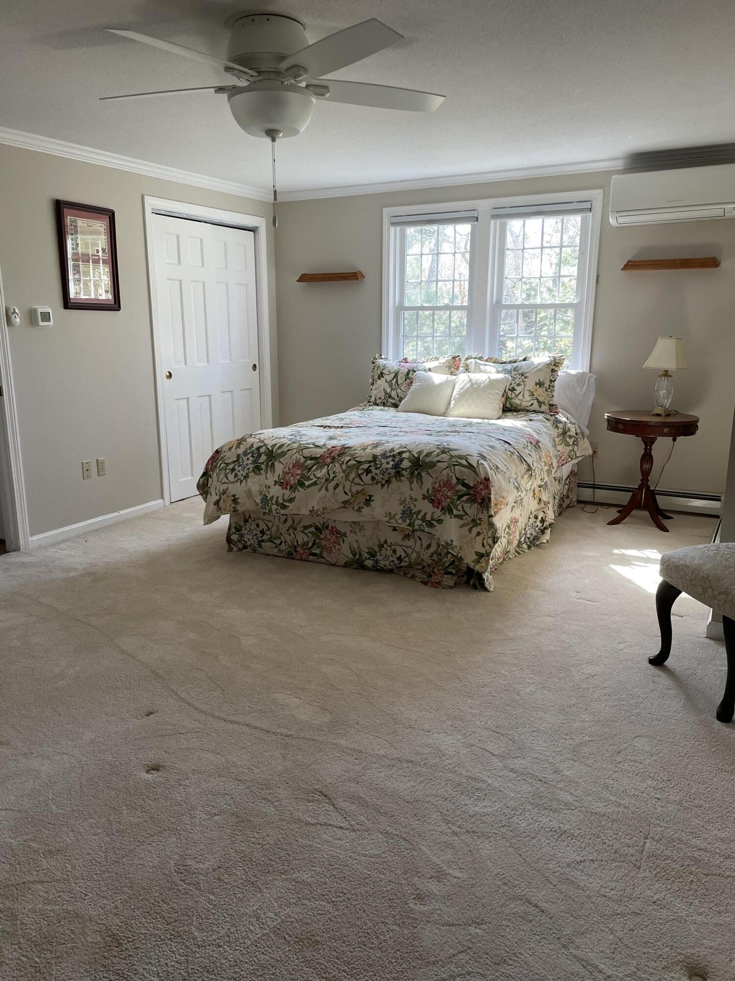 91 Hawser Bend Centerville, MA 02632 - Photo 42 of 42 a bedroom with a bed and window