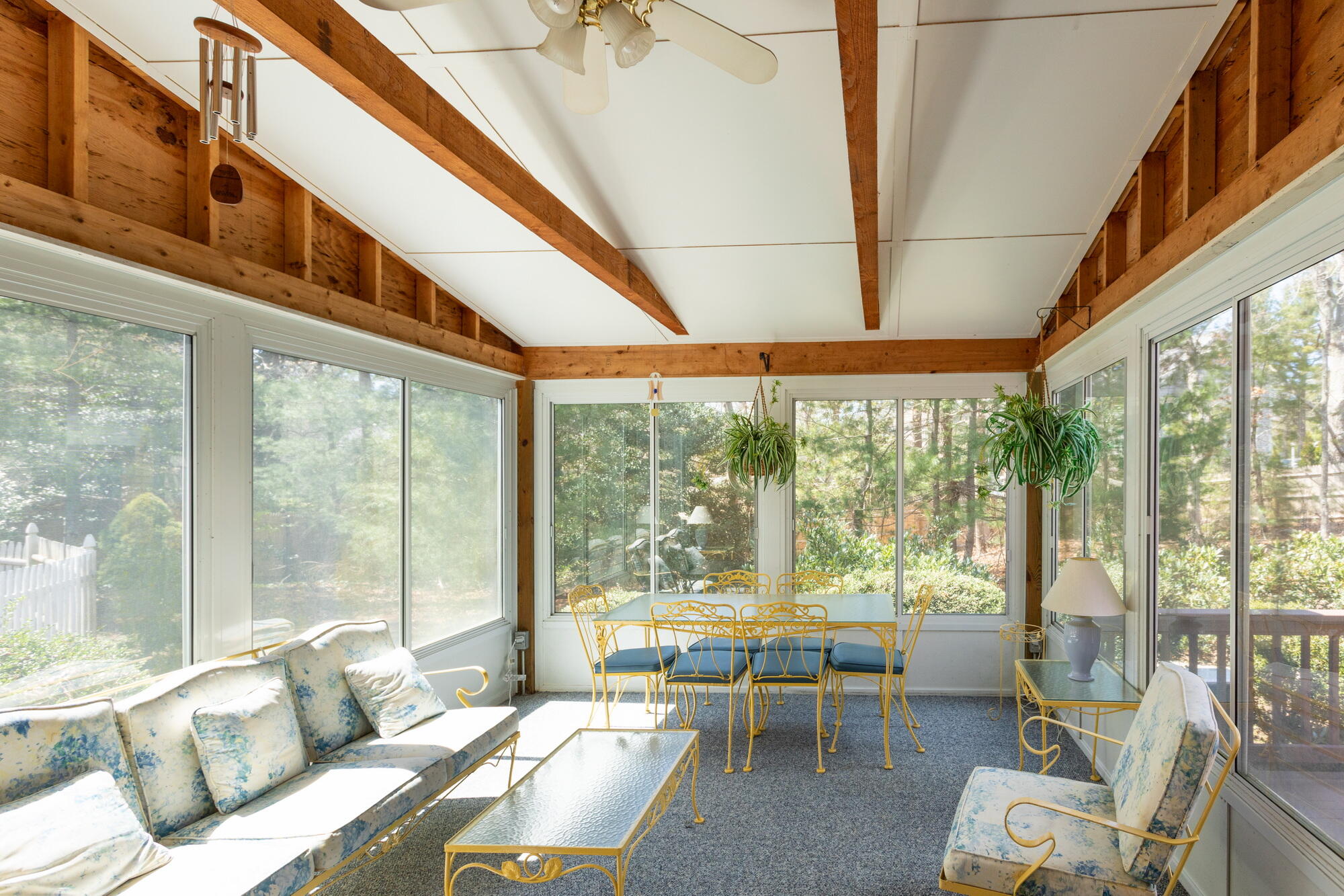 91 Hawser Bend Centerville, MA 02632 - Photo 8 of 42 a living room with furniture and a large window