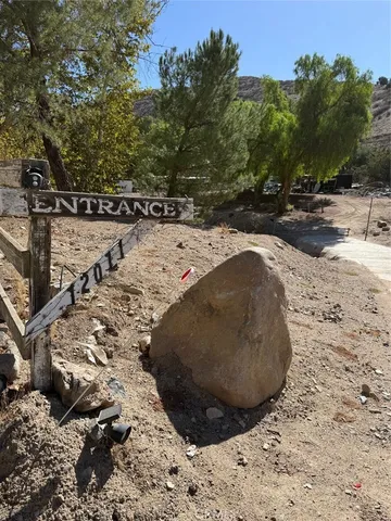a view of a backyard of the house