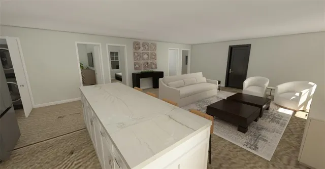 a bedroom with furniture and a rug