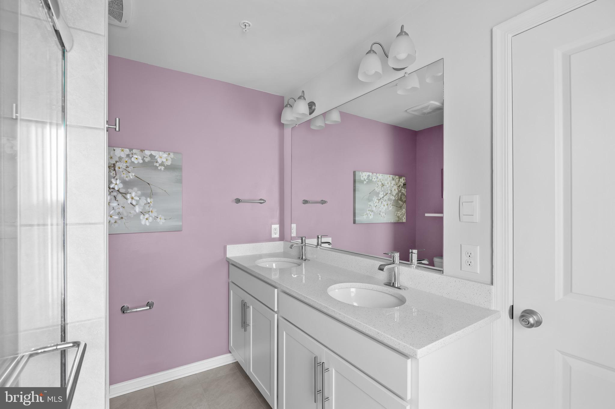 813 Bond Street Frederick, MD 21701 - Photo 30 of 46 a bathroom with a sink vanity granite and a mirror