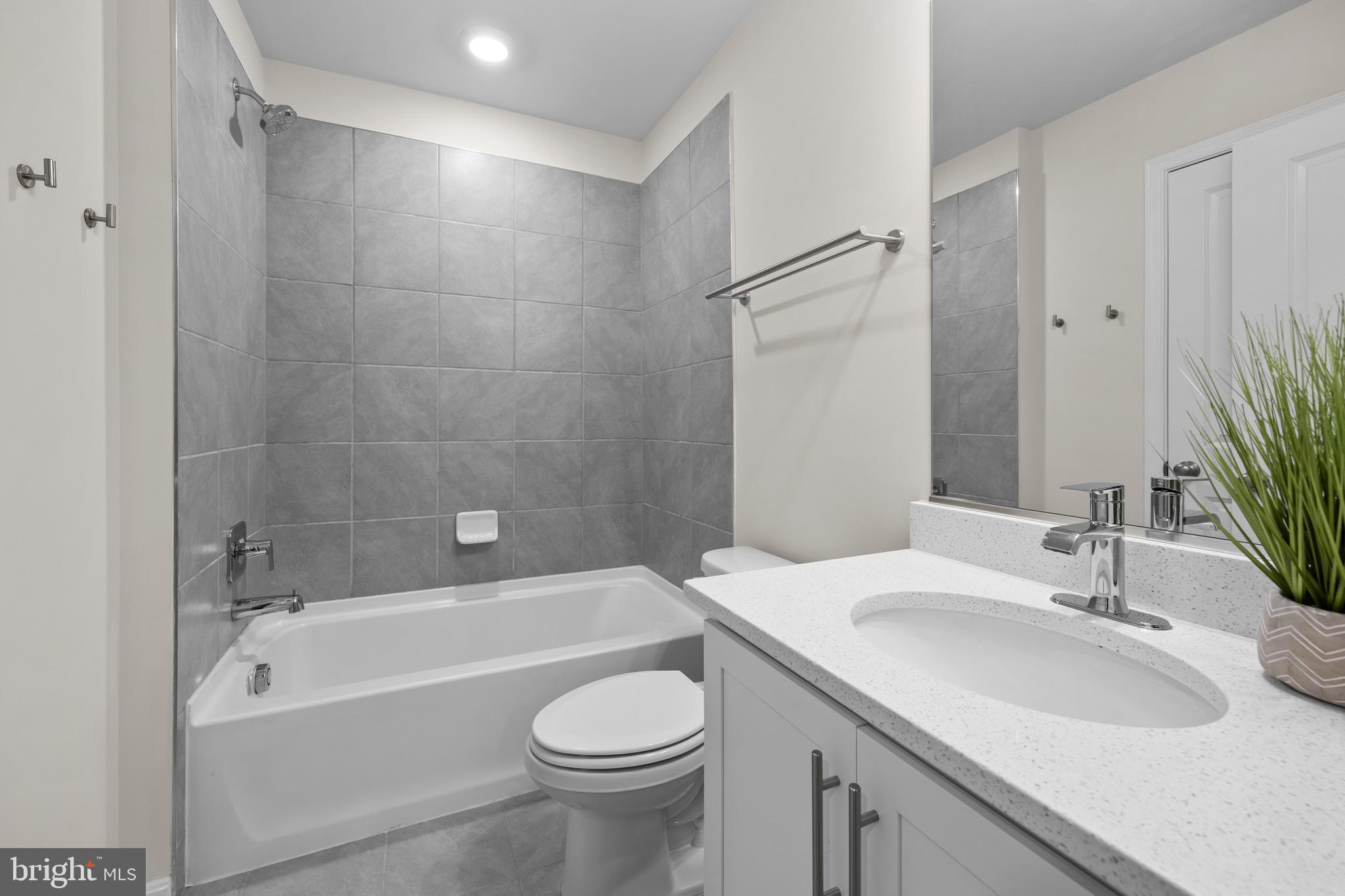 813 Bond Street Frederick, MD 21701 - Photo 33 of 46 a bathroom with a sink a toilet and shower