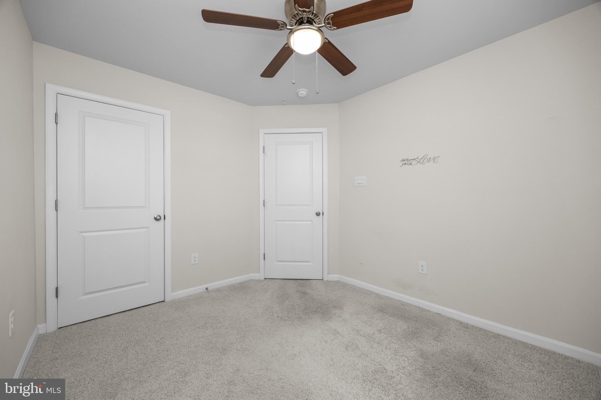 813 Bond Street Frederick, MD 21701 - Photo 41 of 46 an empty room with chandelier fan