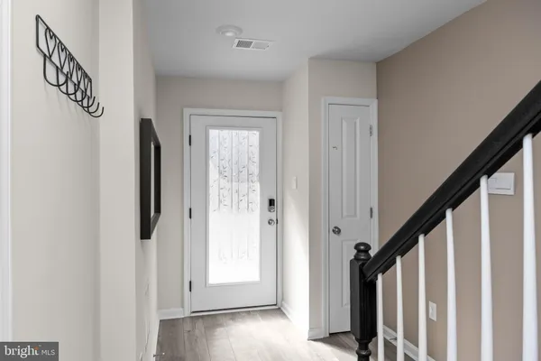 a view of an entryway with staircase