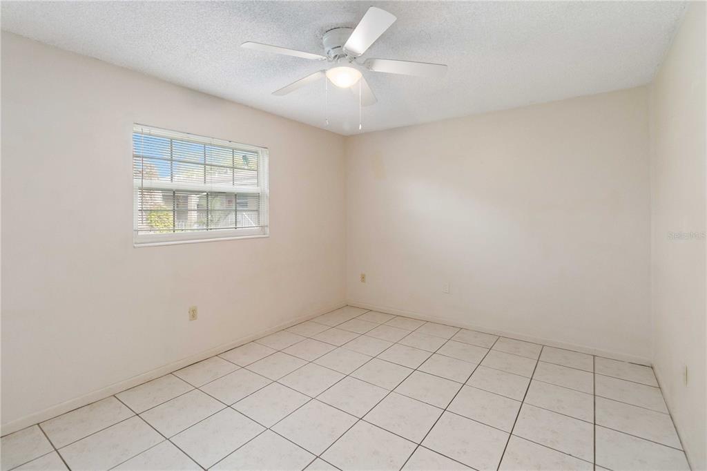 2500 Lee Road, Unit 244 Winter Park, FL 32789 - Photo 16 of 26 an empty room with windows and fan
