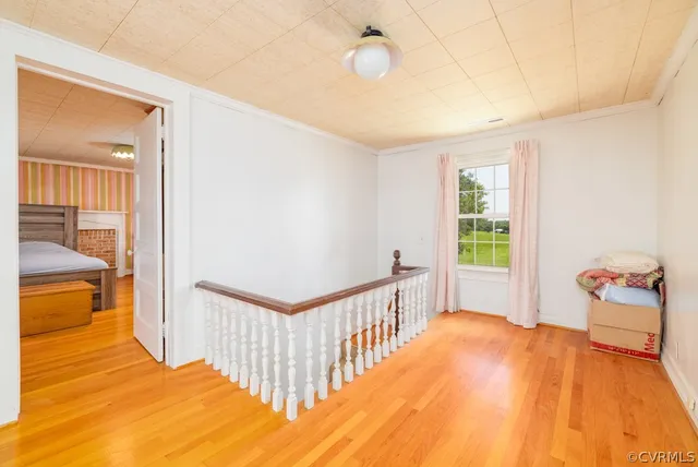 a view of a bedroom and front door