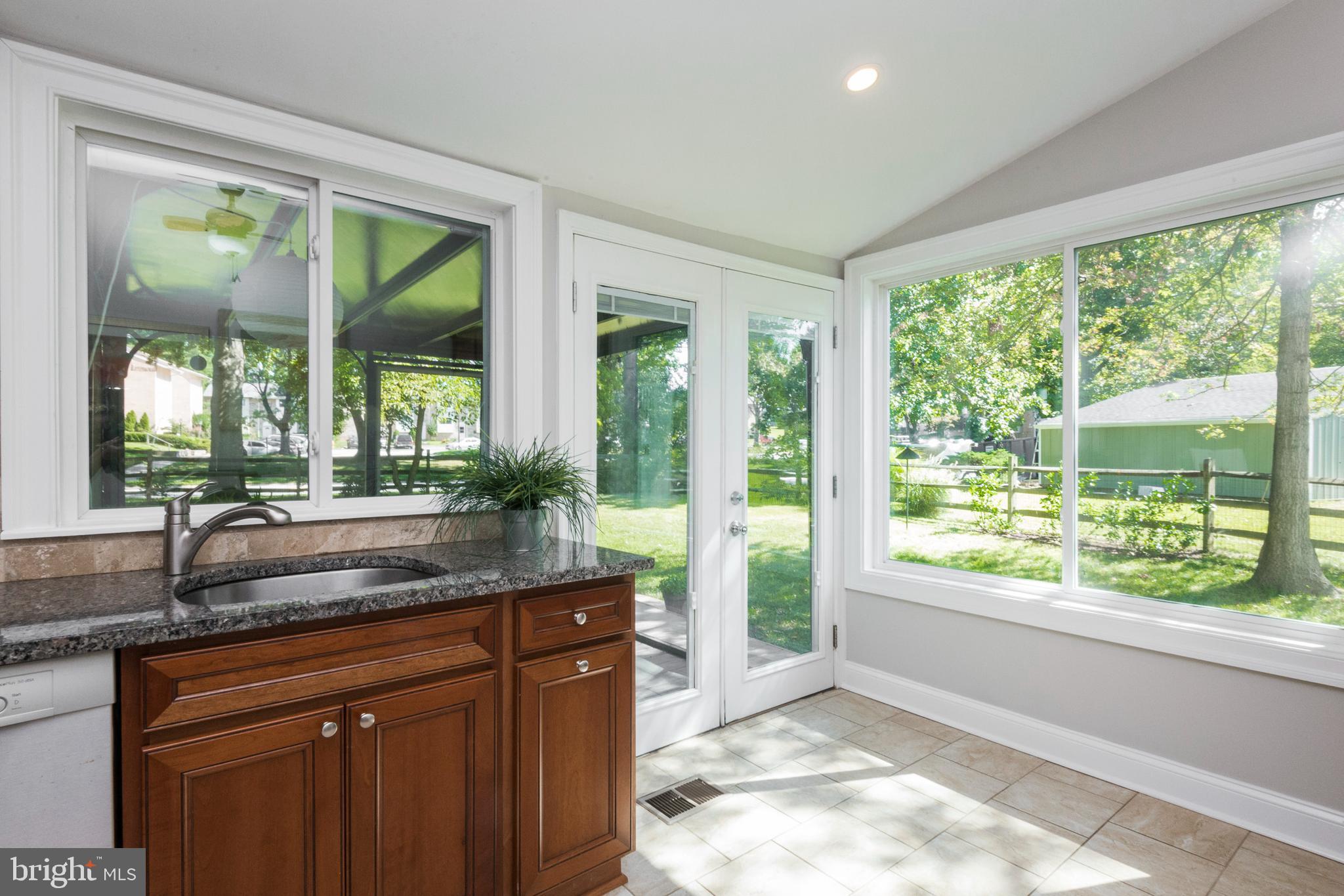 9353 Torrent Row Columbia, MD 21045 - Photo 17 of 40 French Door to deck & backyard