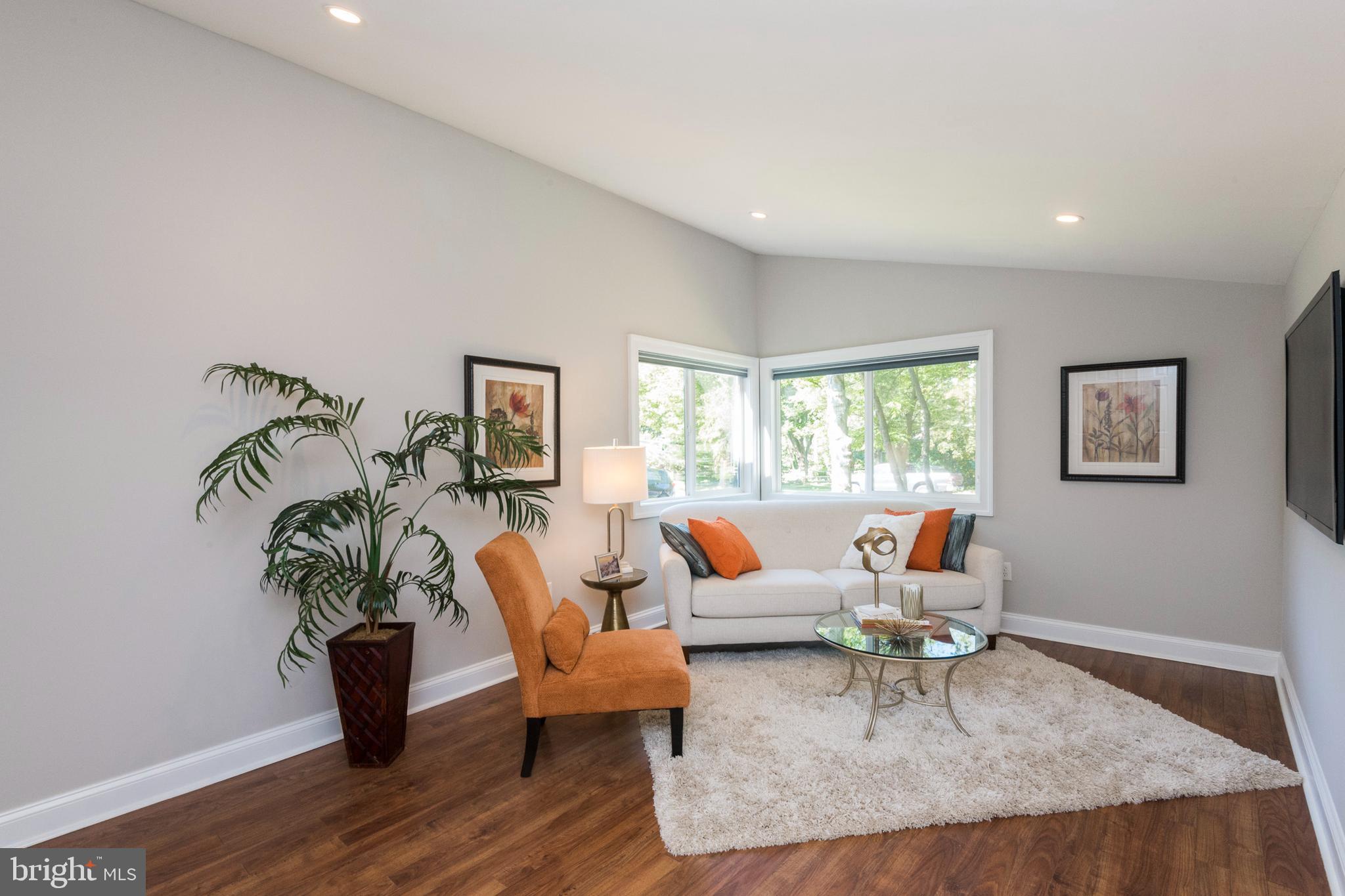 9353 Torrent Row Columbia, MD 21045 - Photo 9 of 40 Living Room with vaulted ceiling
