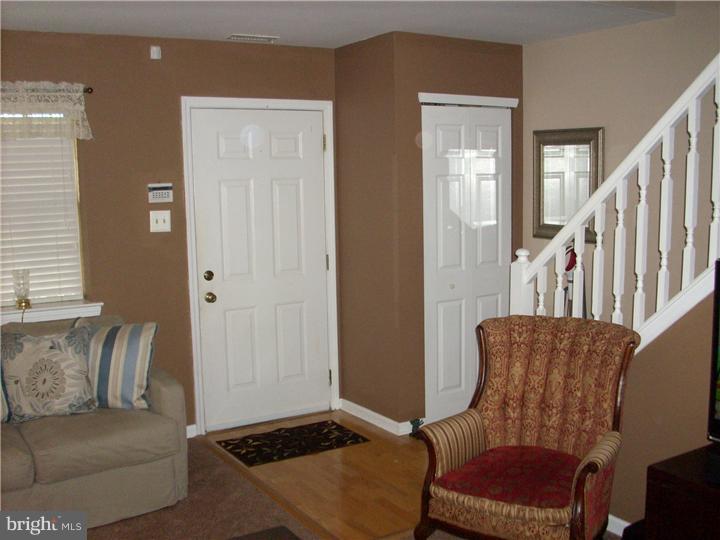 711 Rutland Court Sewell, NJ 08080 - Photo 2 of 18 a living room with furniture and a window