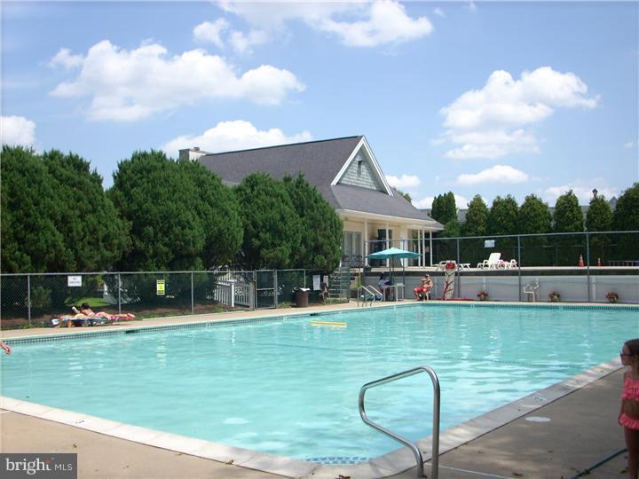 711 Rutland Court Sewell, NJ 08080 - Photo 18 of 18 a view of a house with swimming pool and a yard
