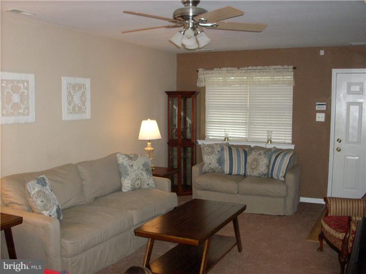 711 Rutland Court Sewell, NJ 08080 - Photo 3 of 18 a living room with furniture and a window