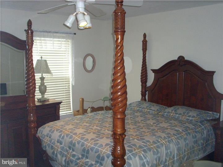711 Rutland Court Sewell, NJ 08080 - Photo 9 of 18 a bedroom with a bed and a window