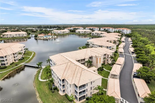 an aerial view of a house with outdoor space
