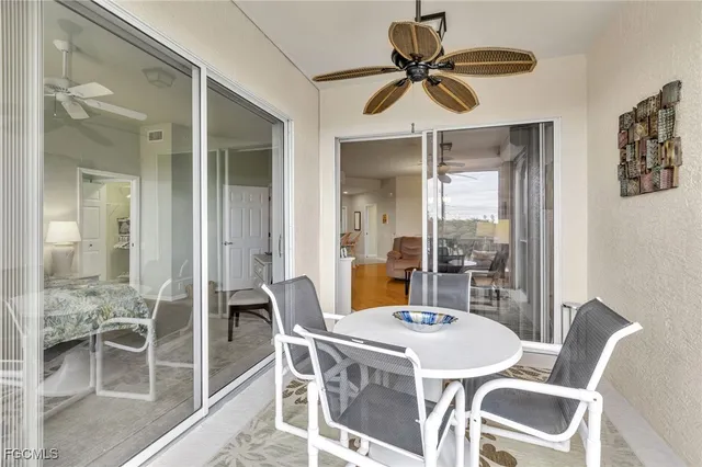 a view of hallway with an empty room