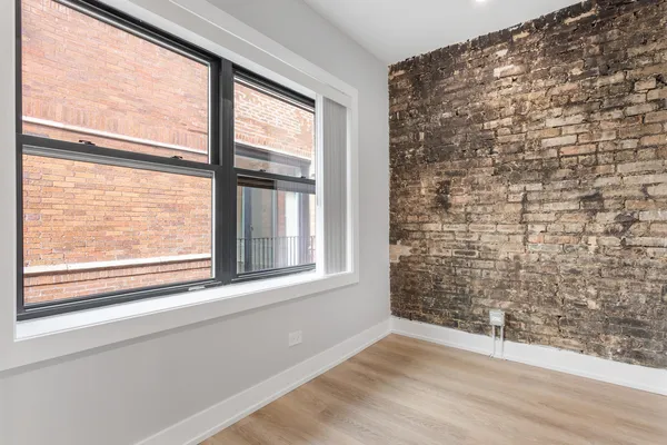 a view of empty room with a window