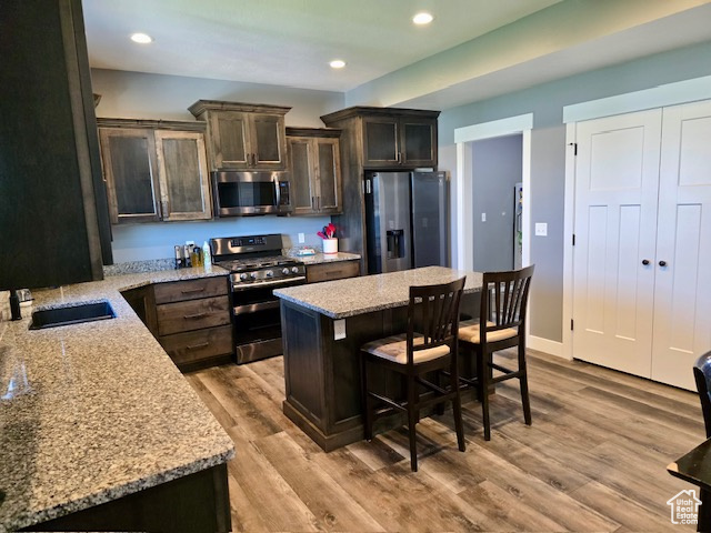 718 700 East Preston, ID 83263 - Photo 7 of 45 Dual oven gas stove, access to garage, utility area and walk in pantry