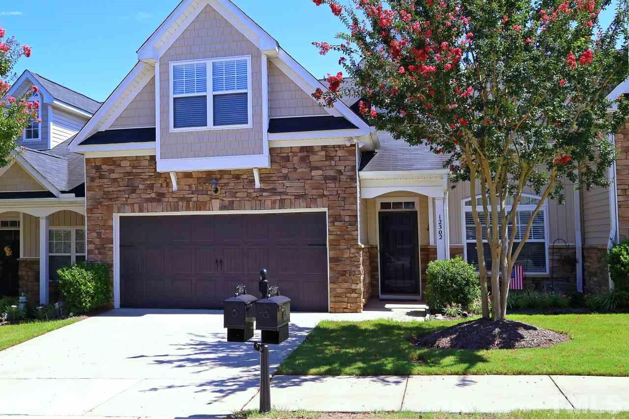 12302 Mossgreen Street Raleigh, NC 27614 - Photo 1 of 25 Welcome Home! This lovely town home sits on a quant street lined with beautiful crape myrtle trees and features a stone façade, cover front entry porch and gorgeous landscaping!