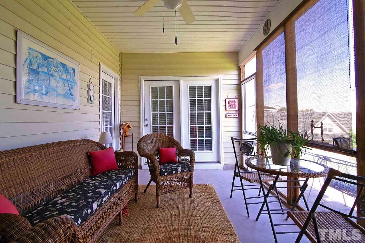 12302 Mossgreen Street Raleigh, NC 27614 - Photo 11 of 25 Enjoy some peaceful time outside on the private screened porch!