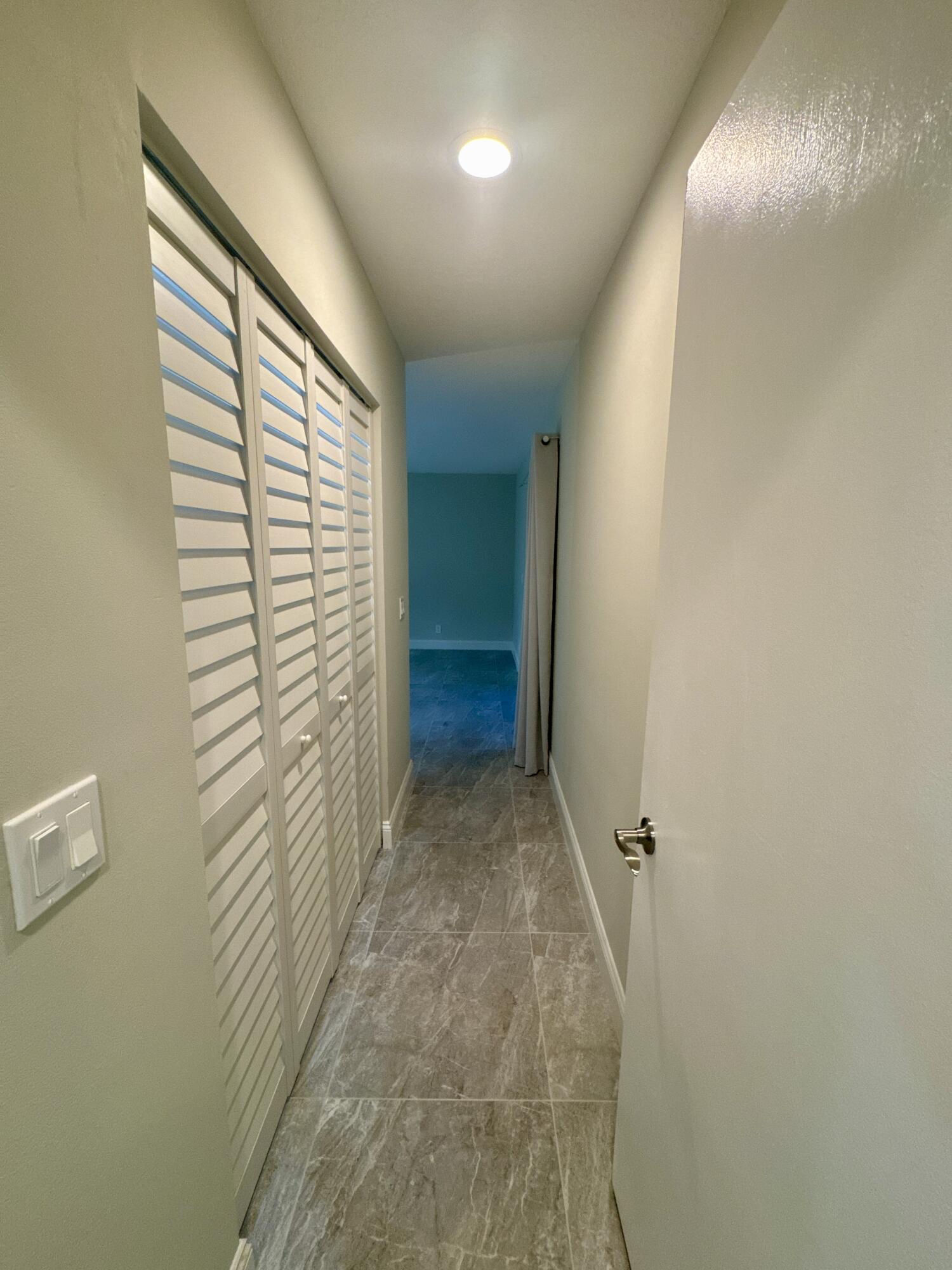 4160 Northwest 7th Court Delray Beach, FL 33445 - Photo 16 of 46 a view of hallway with stairs