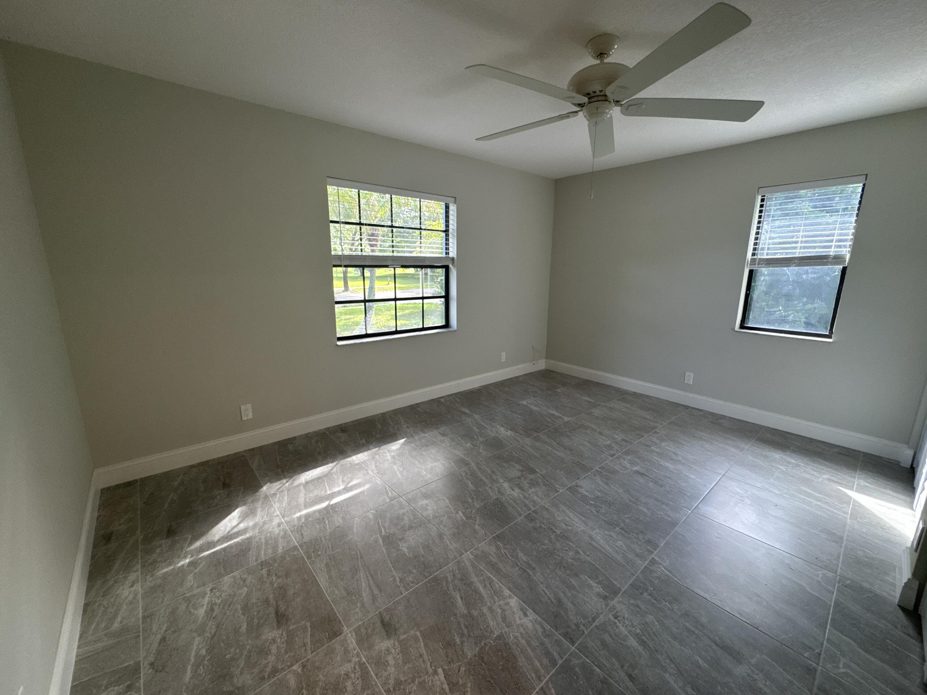 4160 Northwest 7th Court Delray Beach, FL 33445 - Photo 24 of 46 a view of an empty room with a window