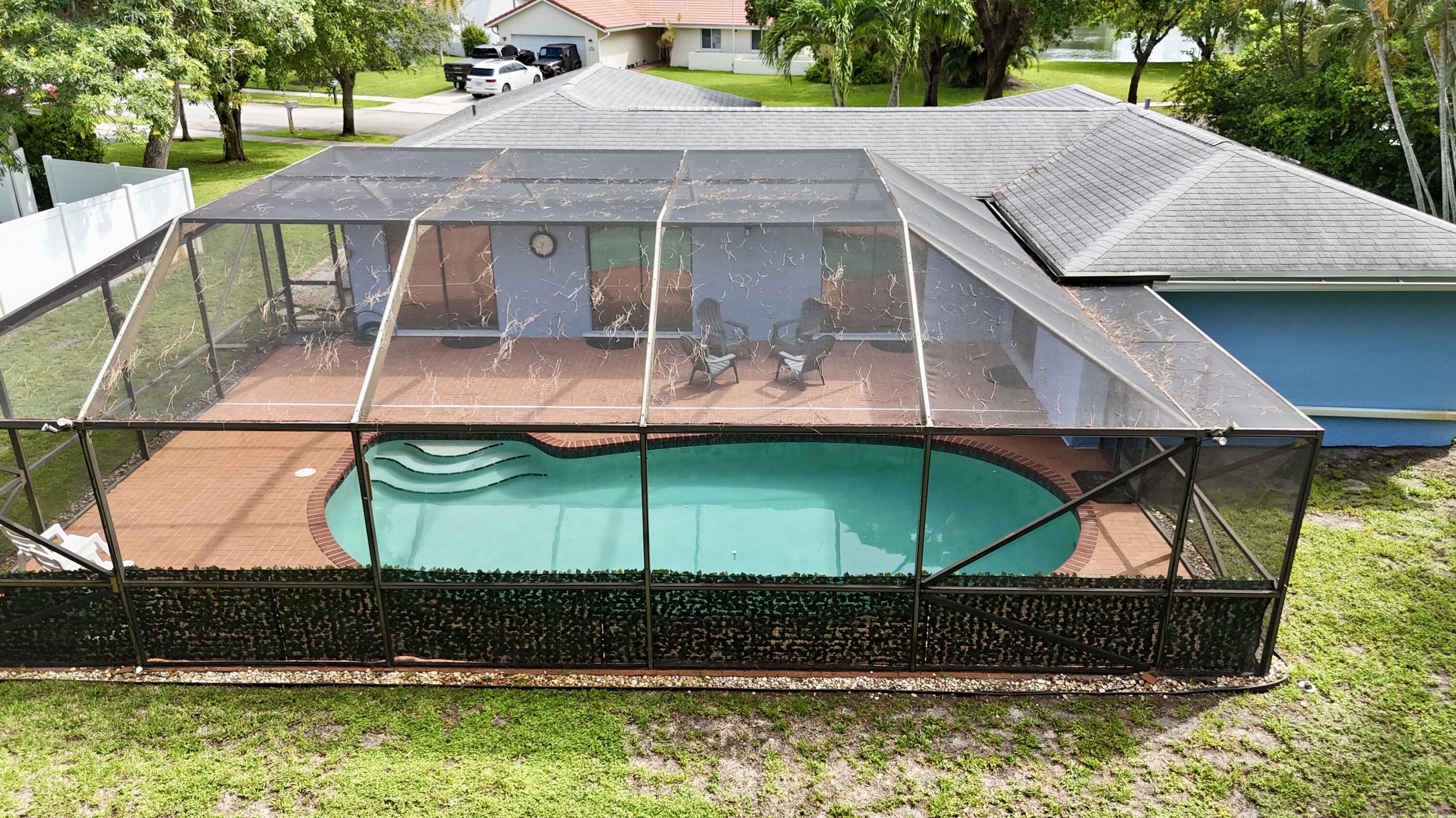 4160 Northwest 7th Court Delray Beach, FL 33445 - Photo 39 of 46 a view of a house with a yard