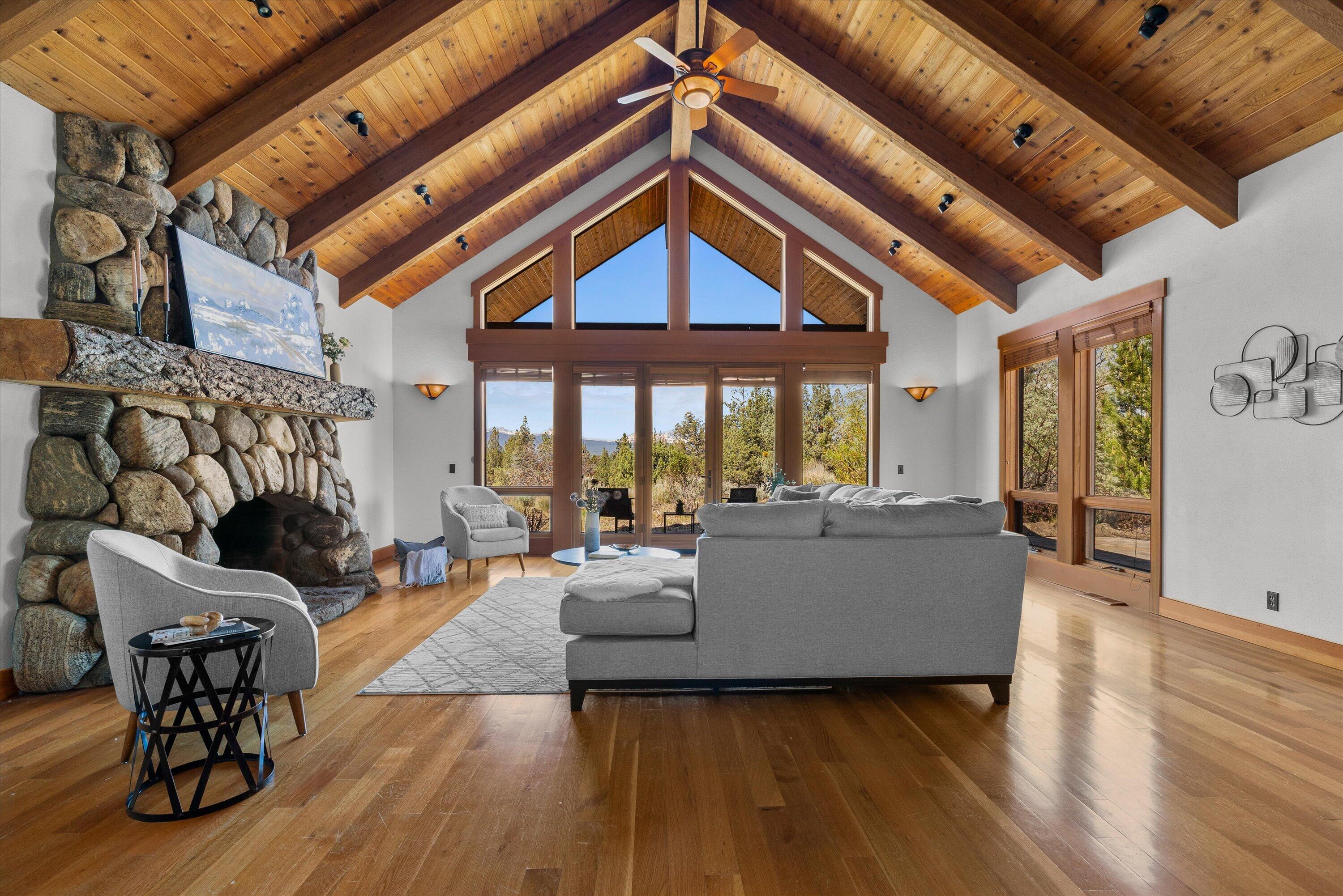 64155 Hunnell Road Bend, OR 97703 - Photo 9 of 96 The craftsmanship is striking with vaulted wood ceilings and exposed beams.