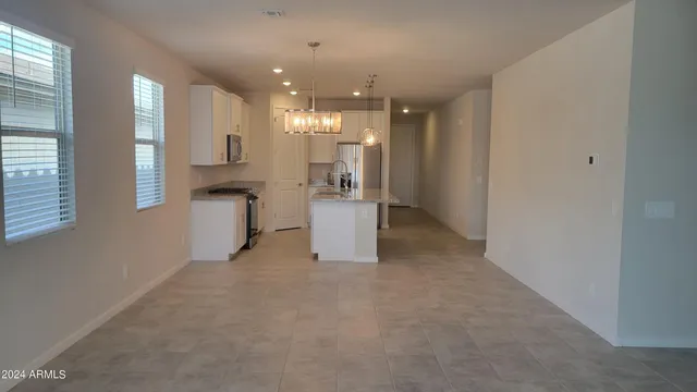 a view of a kitchen with a sink