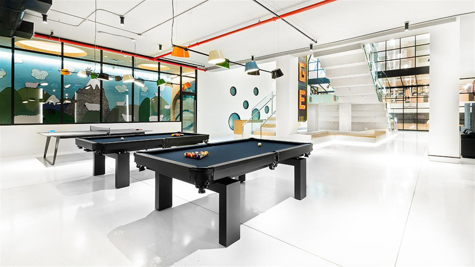 606 West 57th Street, Unit 1438 Manhattan, NY 10019 - Photo 16 of 23 a view of a room with a table and chairs