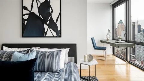 a view of table and chairs in room