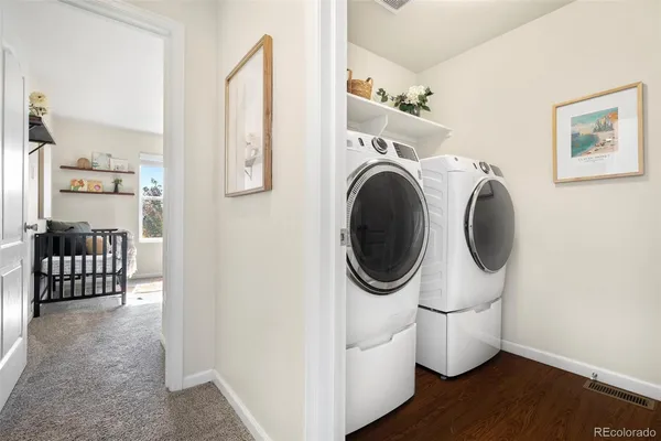 a view of a room with washer and dryer