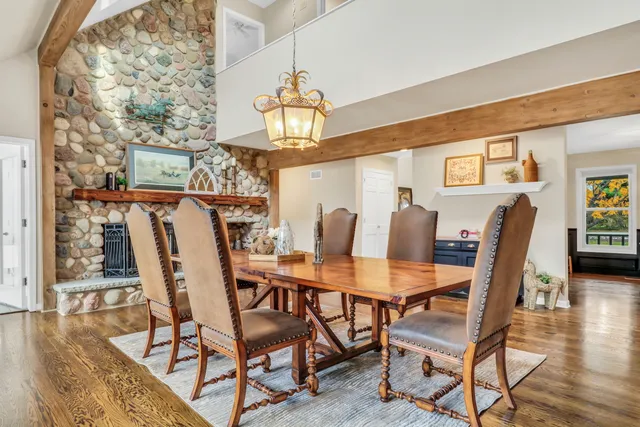 a living room with fireplace furniture and a flat screen tv