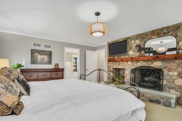 a view of an empty room with wooden walls