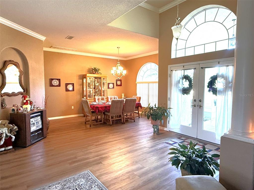7552 River Country Drive Weeki Wachee, FL 34607 - Photo 14 of 59 a living room with furniture and a large window